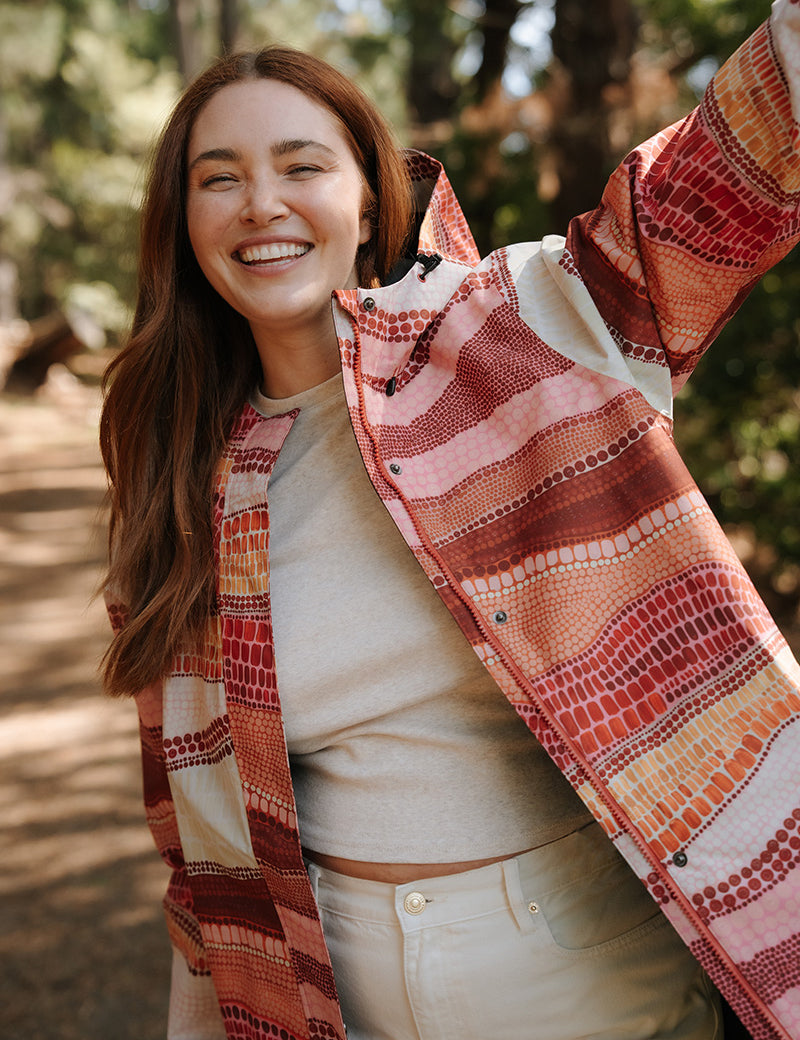 AmbleOutdoorsWomensRefugeMidThighLengthWaterproofJacketBurntBirarrArtCollab.jpg