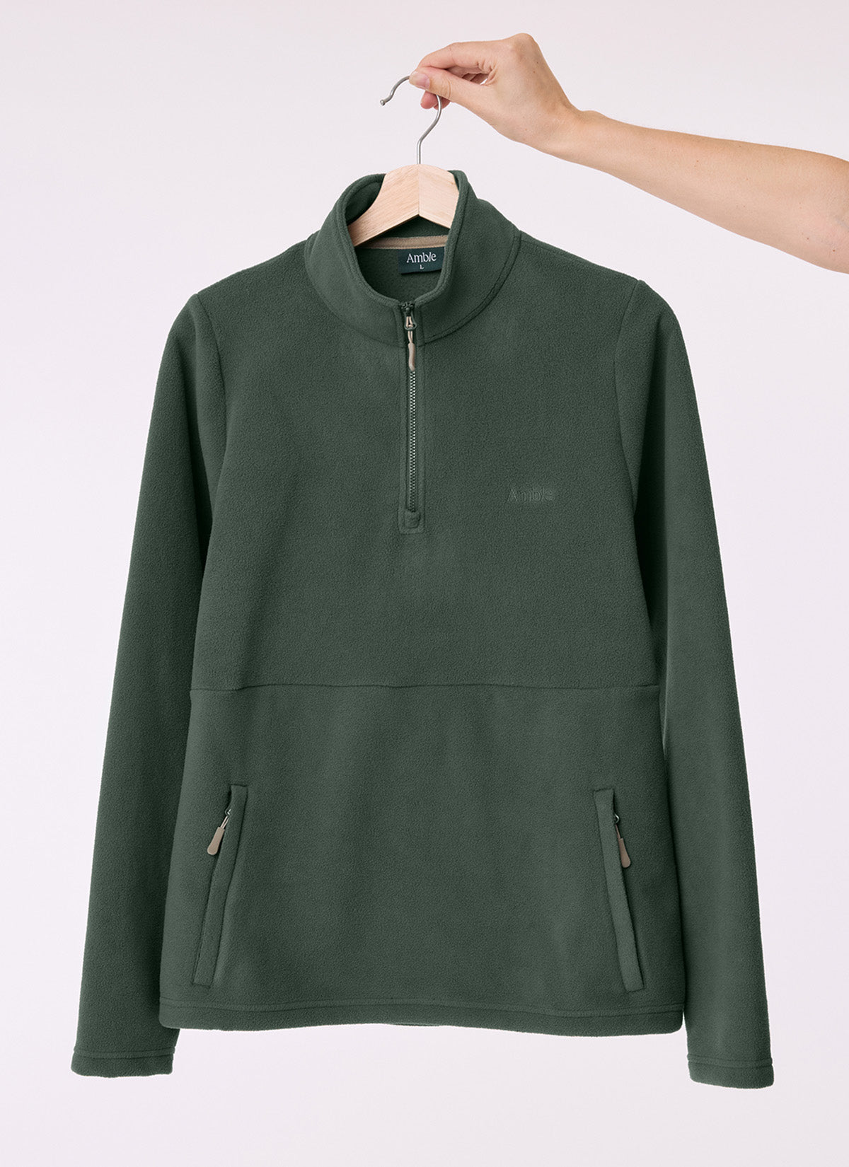 Sugarloaf Fleece in Pine Green on a hanger